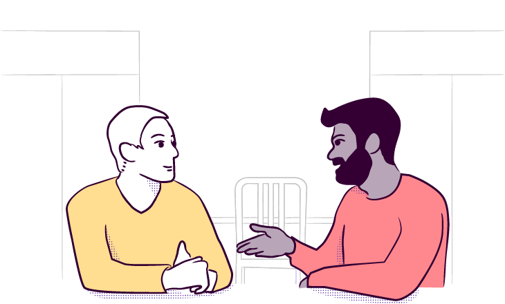 two people talking at table